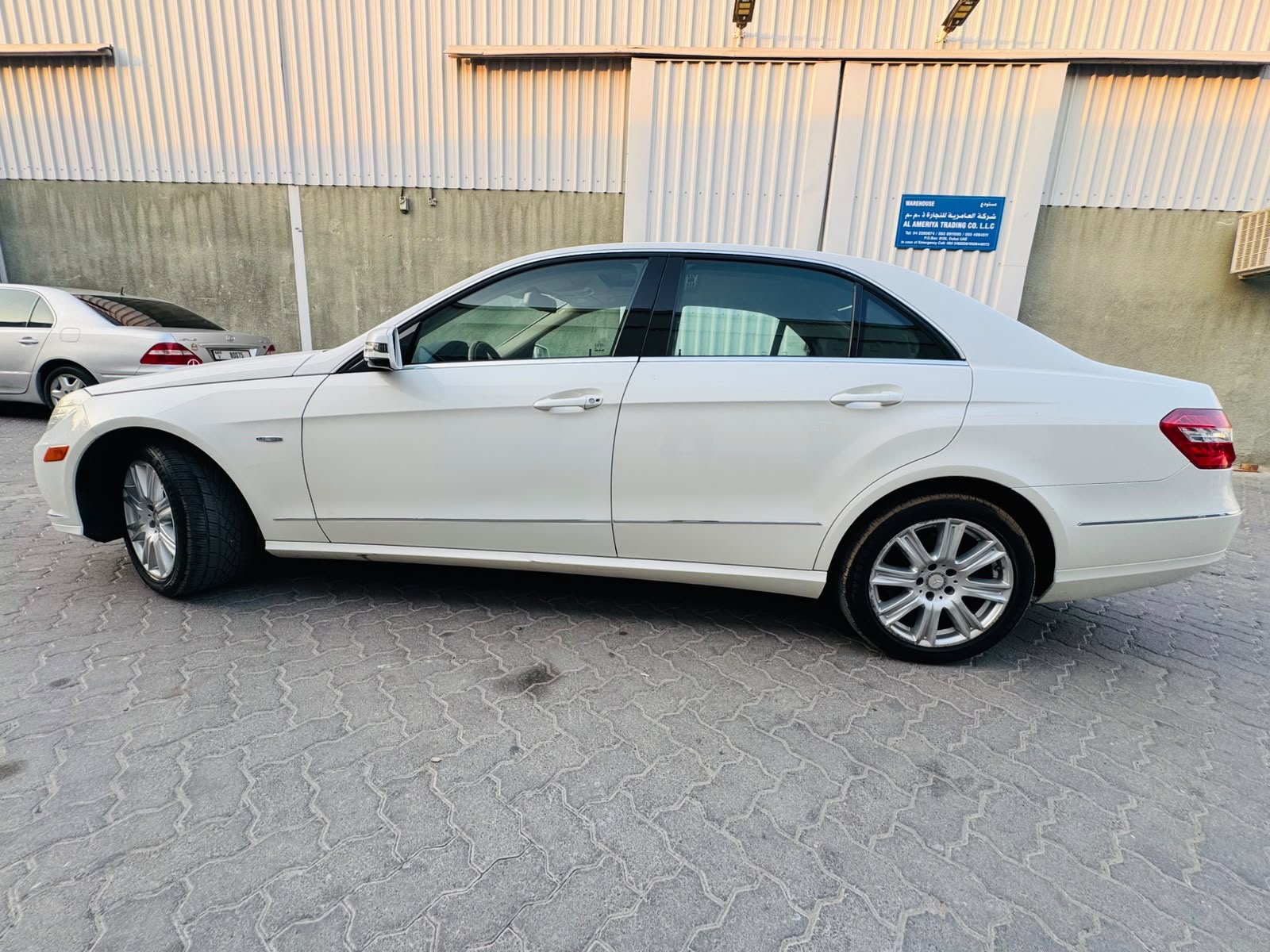 White Mercedes Benz E350 2012