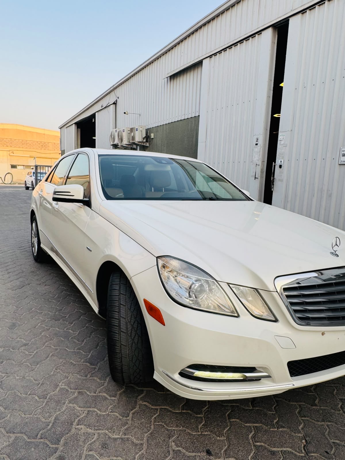 White Mercedes Benz E350 2012