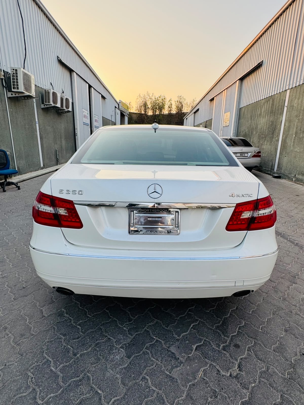 White Mercedes Benz E350 2012