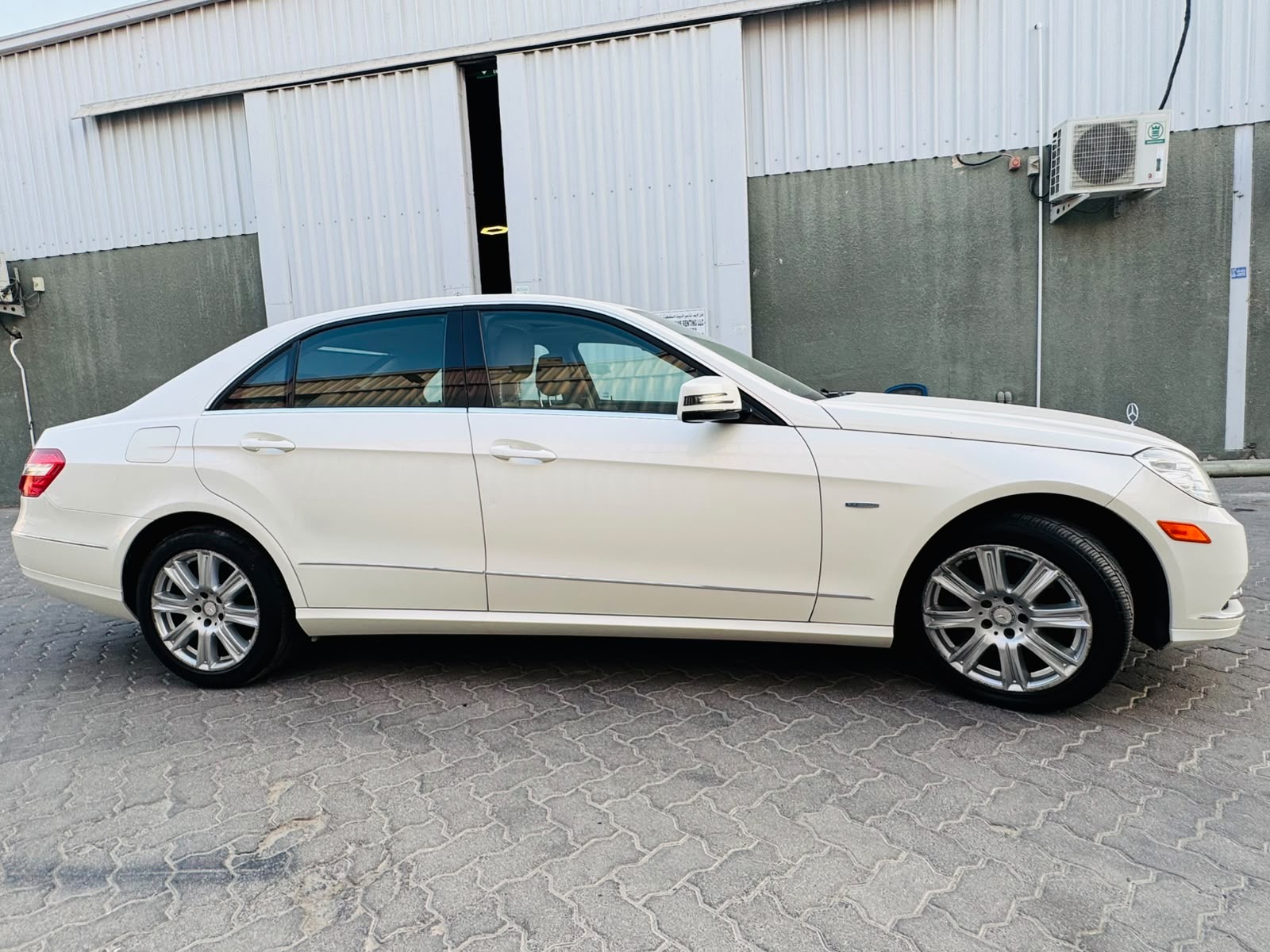 White Mercedes Benz E350 2012