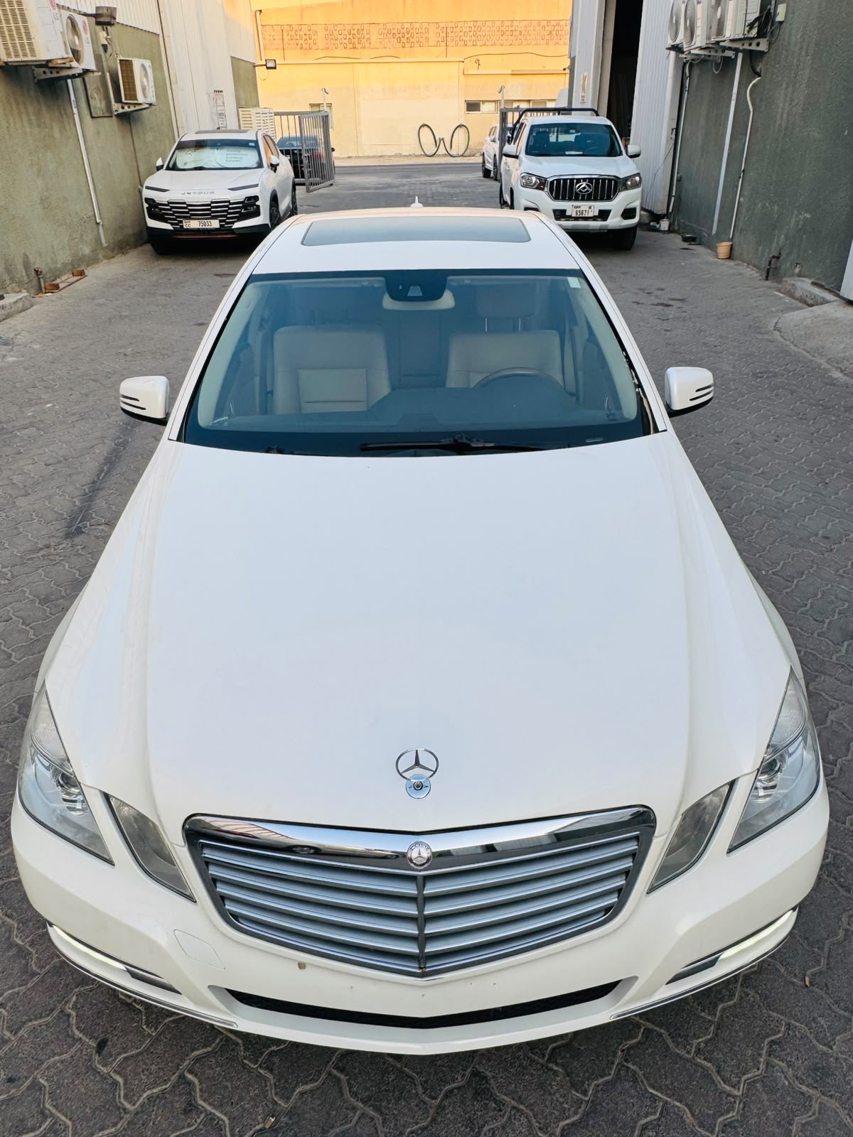White Mercedes Benz E350 2012