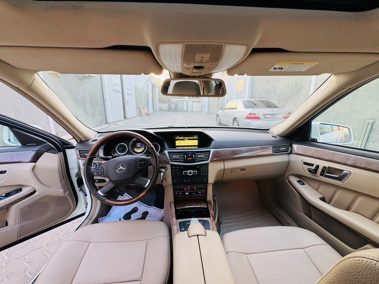 White Mercedes Benz E350 2012