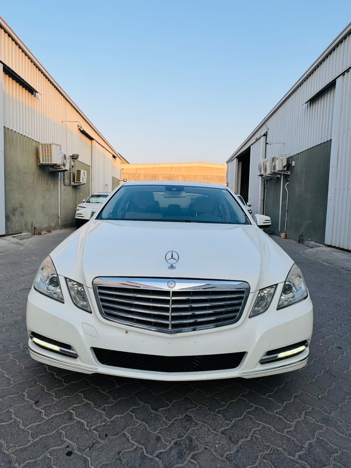 White Mercedes Benz E350 2012