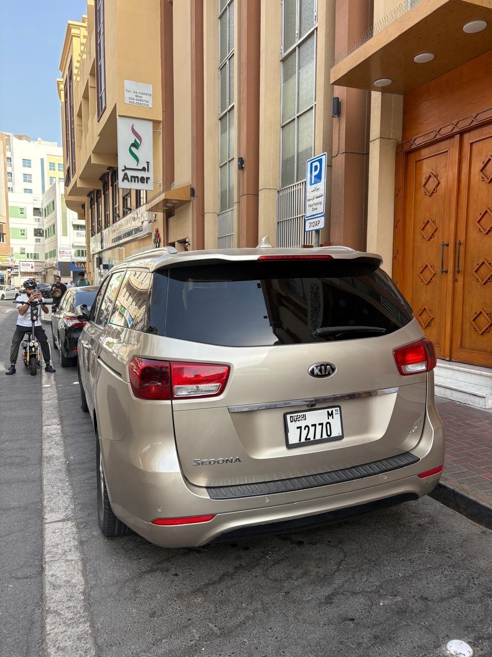 Beige Kia Sedona LX 2017