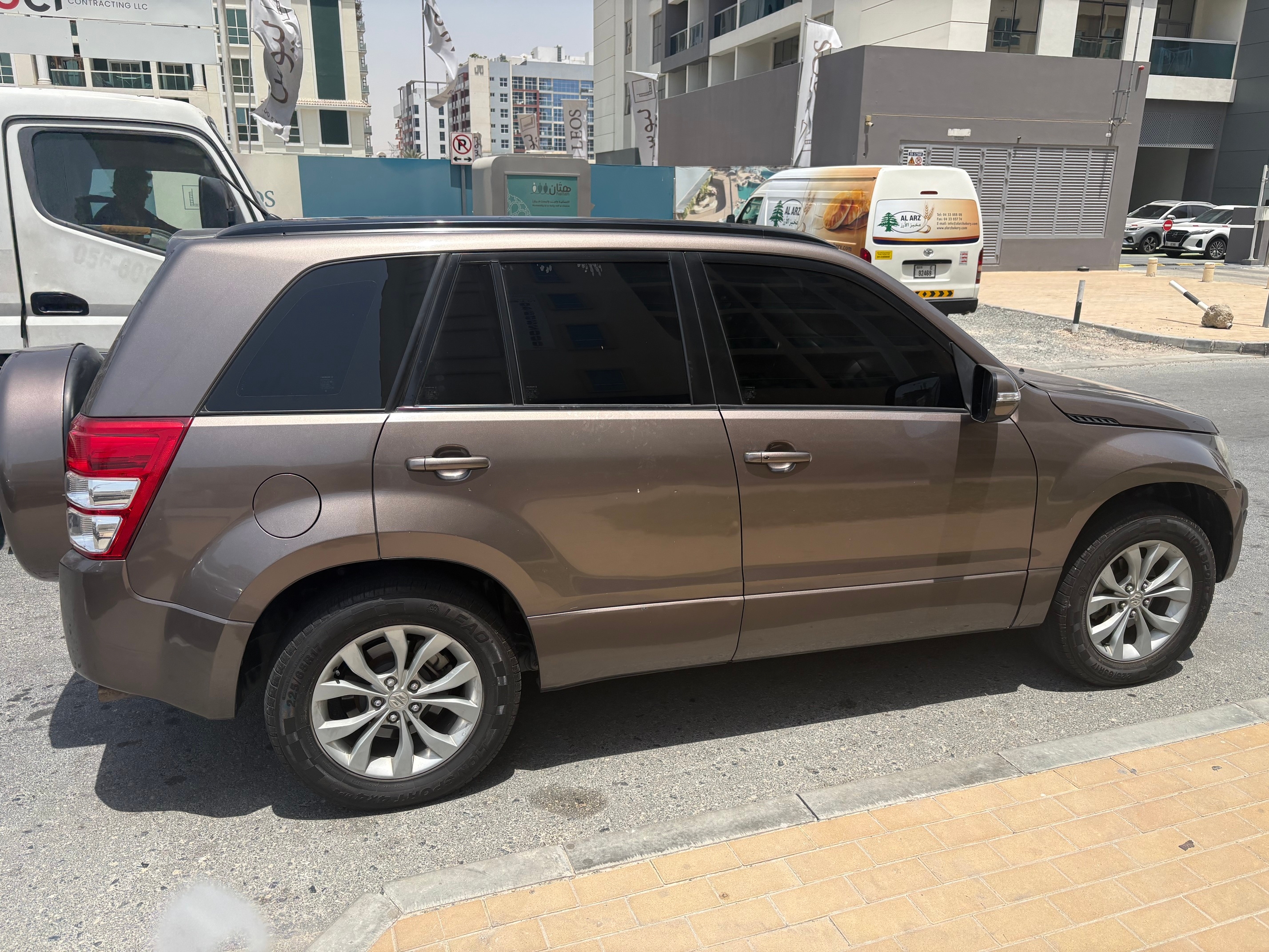 Brown Suzuki Grand Vitara 2016