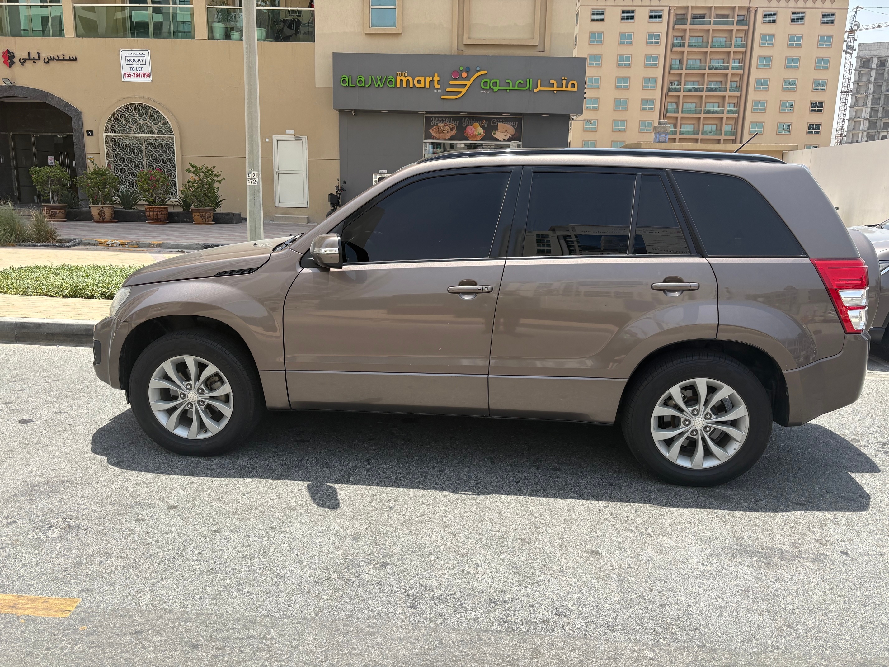 Kahverengi Suzuki Grand Vitara 2016