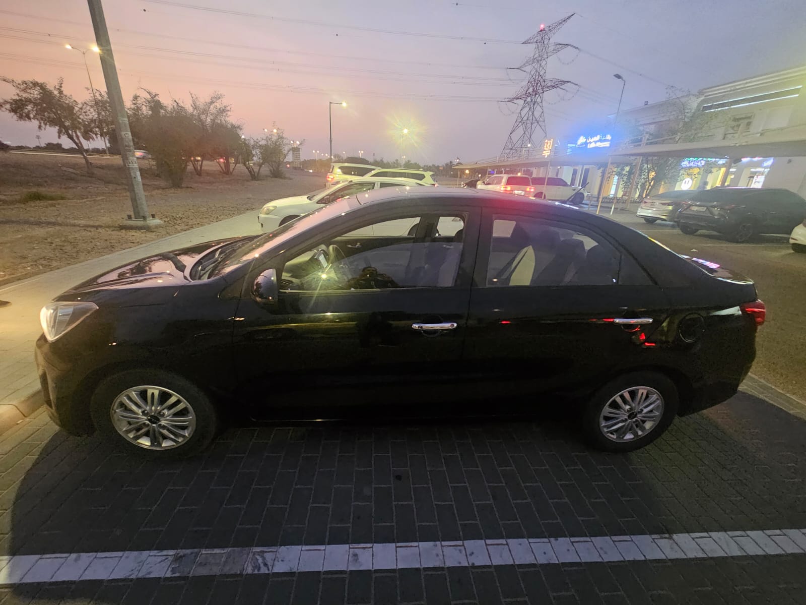 Black Kia Pegas EX 2022