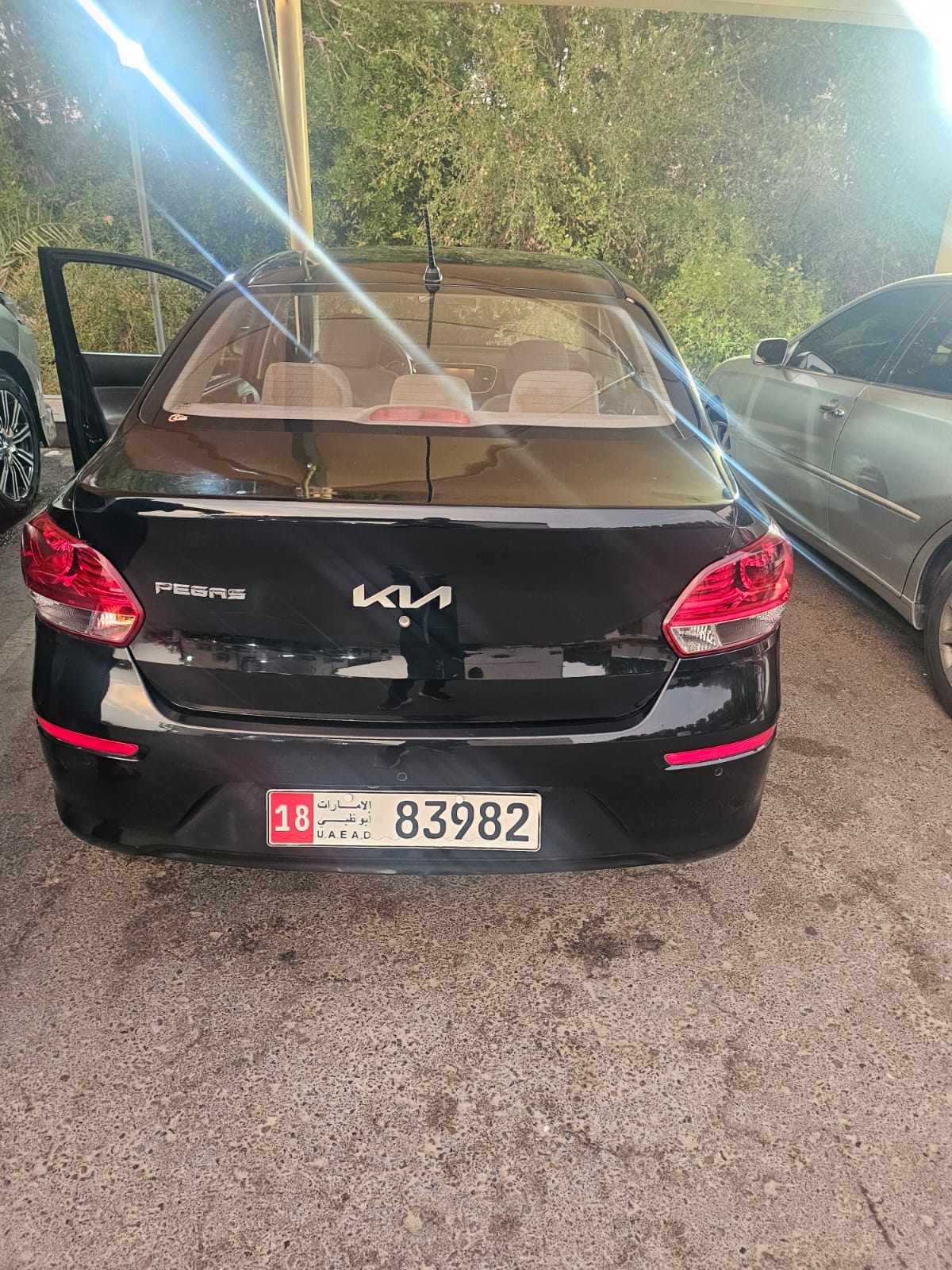 Black Kia Pegas EX 2022