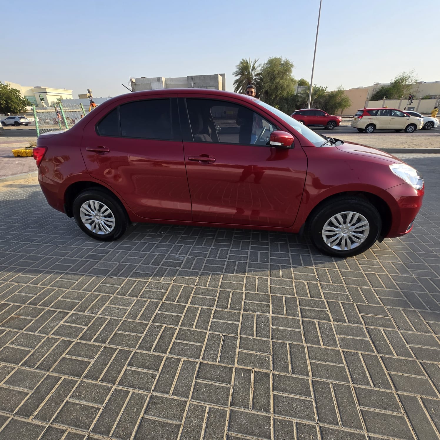 rood Suzuki Dzire GL 2023