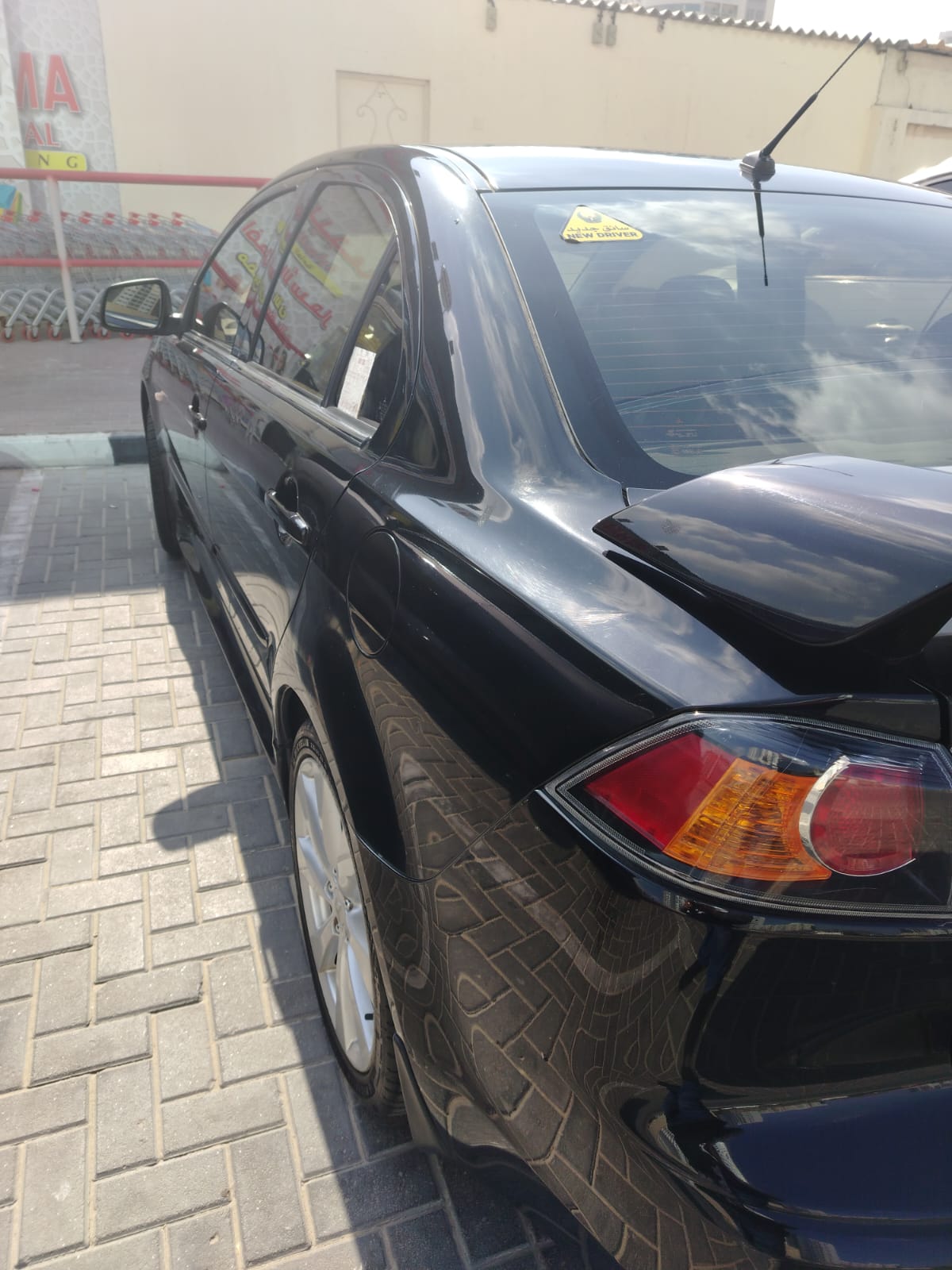 Nero Mitsubishi Lancer EX GLX 2013