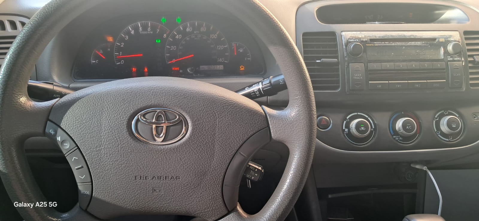 Light Blue Toyota Camry LE 2005