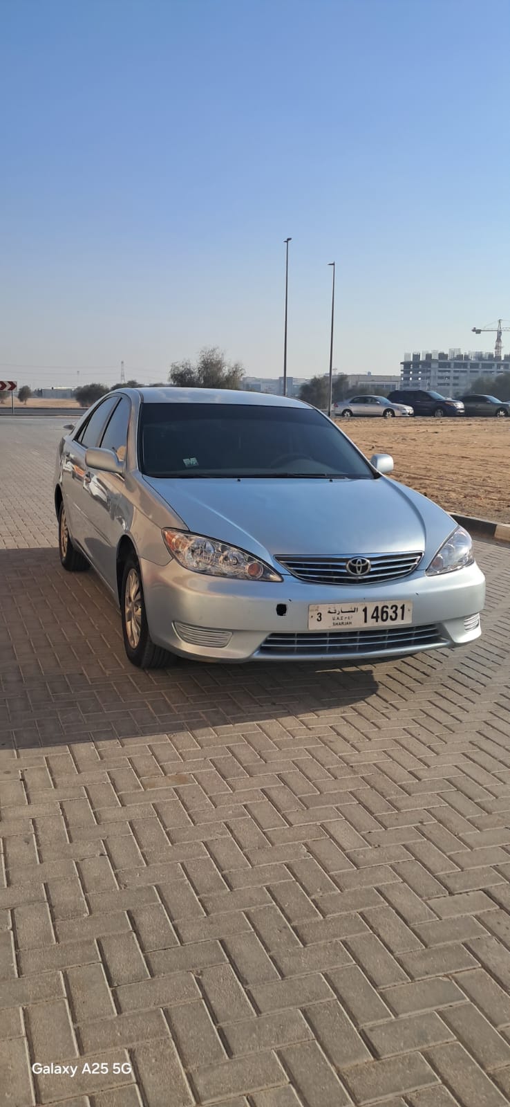 Bleu clair Toyota Camry LE 2005