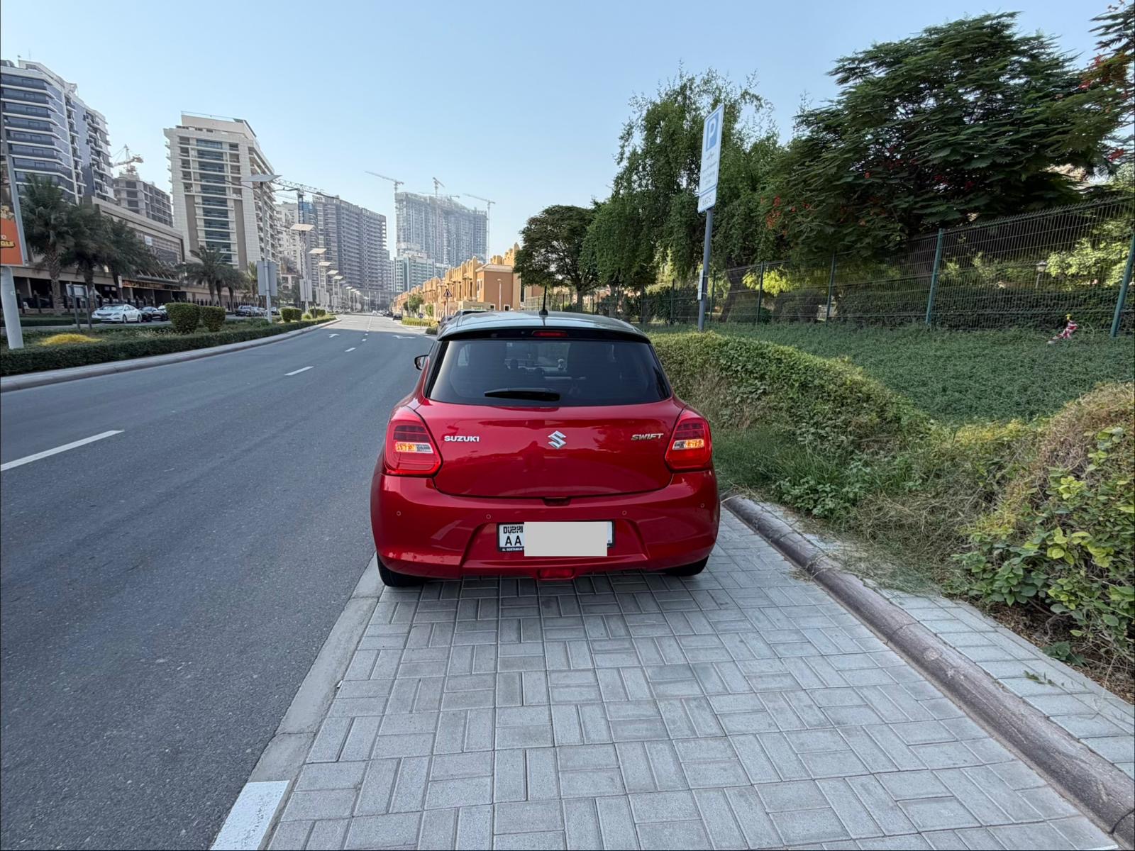 Red Suzuki Swift GLX 2024