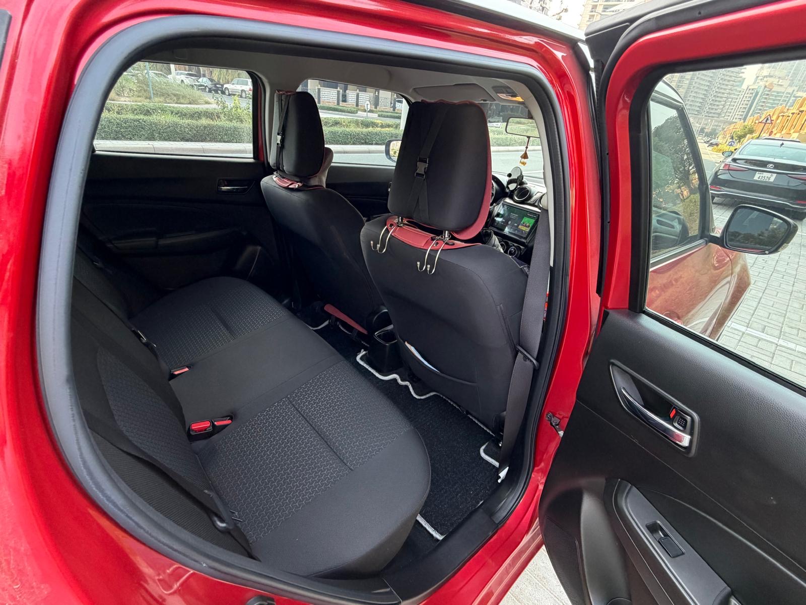 Red Suzuki Swift GLX 2024