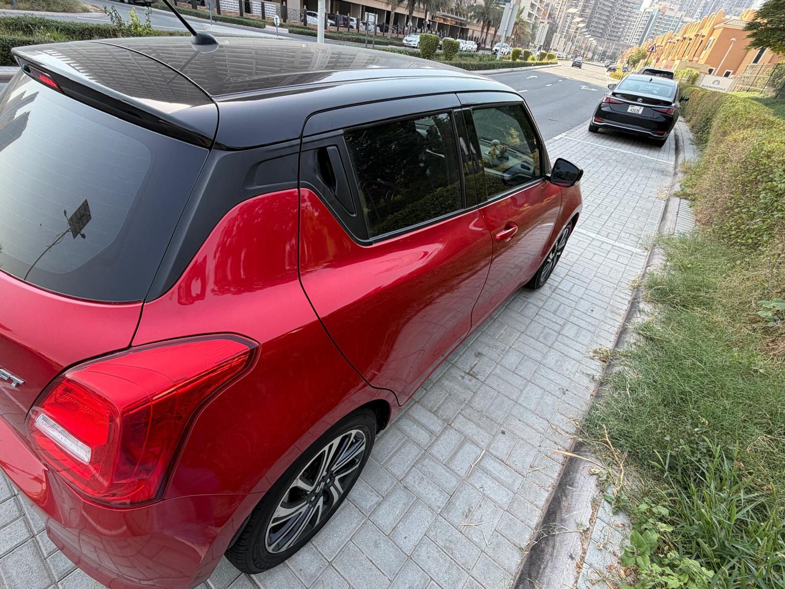 Red Suzuki Swift GLX 2024