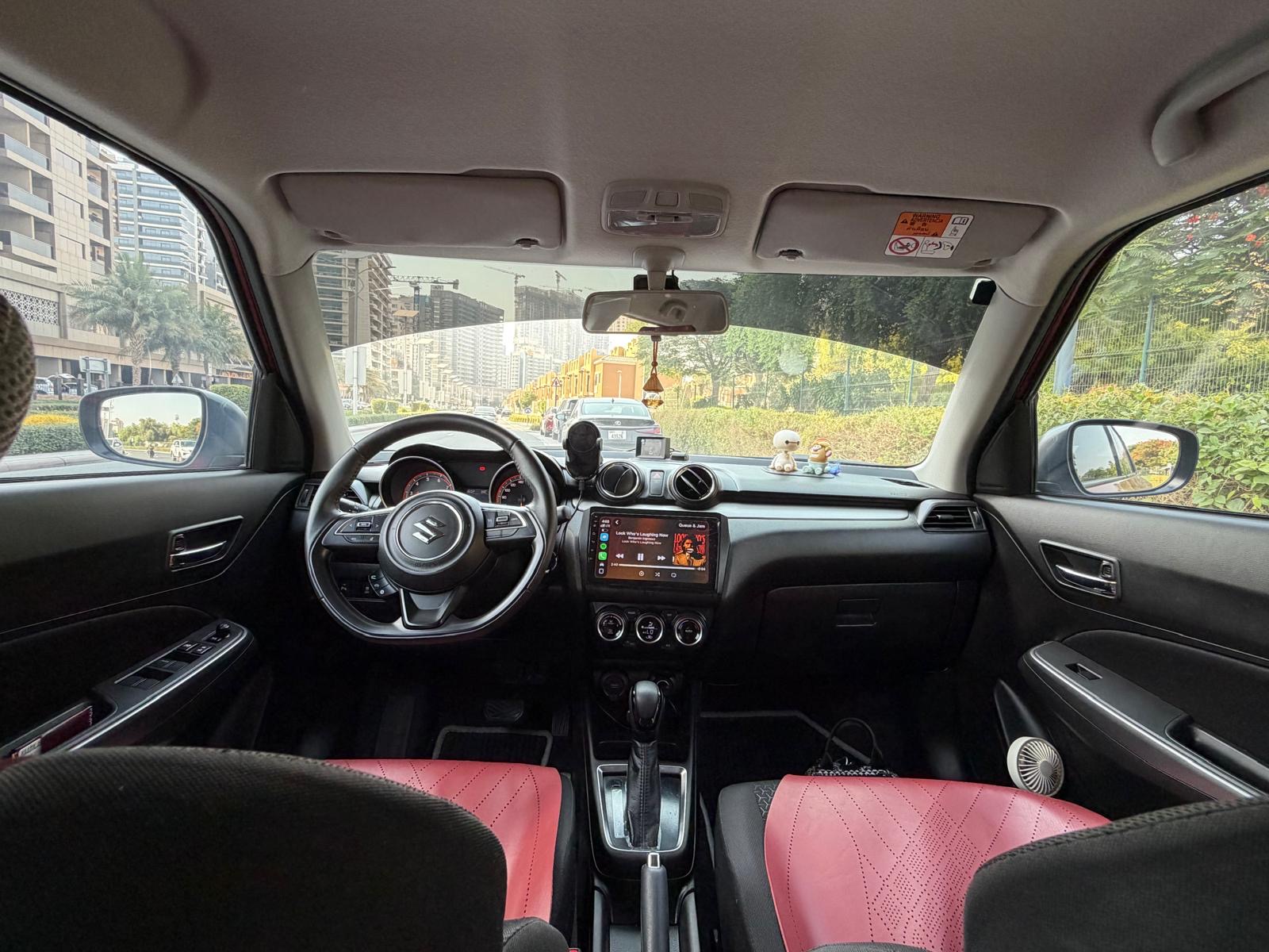 Red Suzuki Swift GLX 2024
