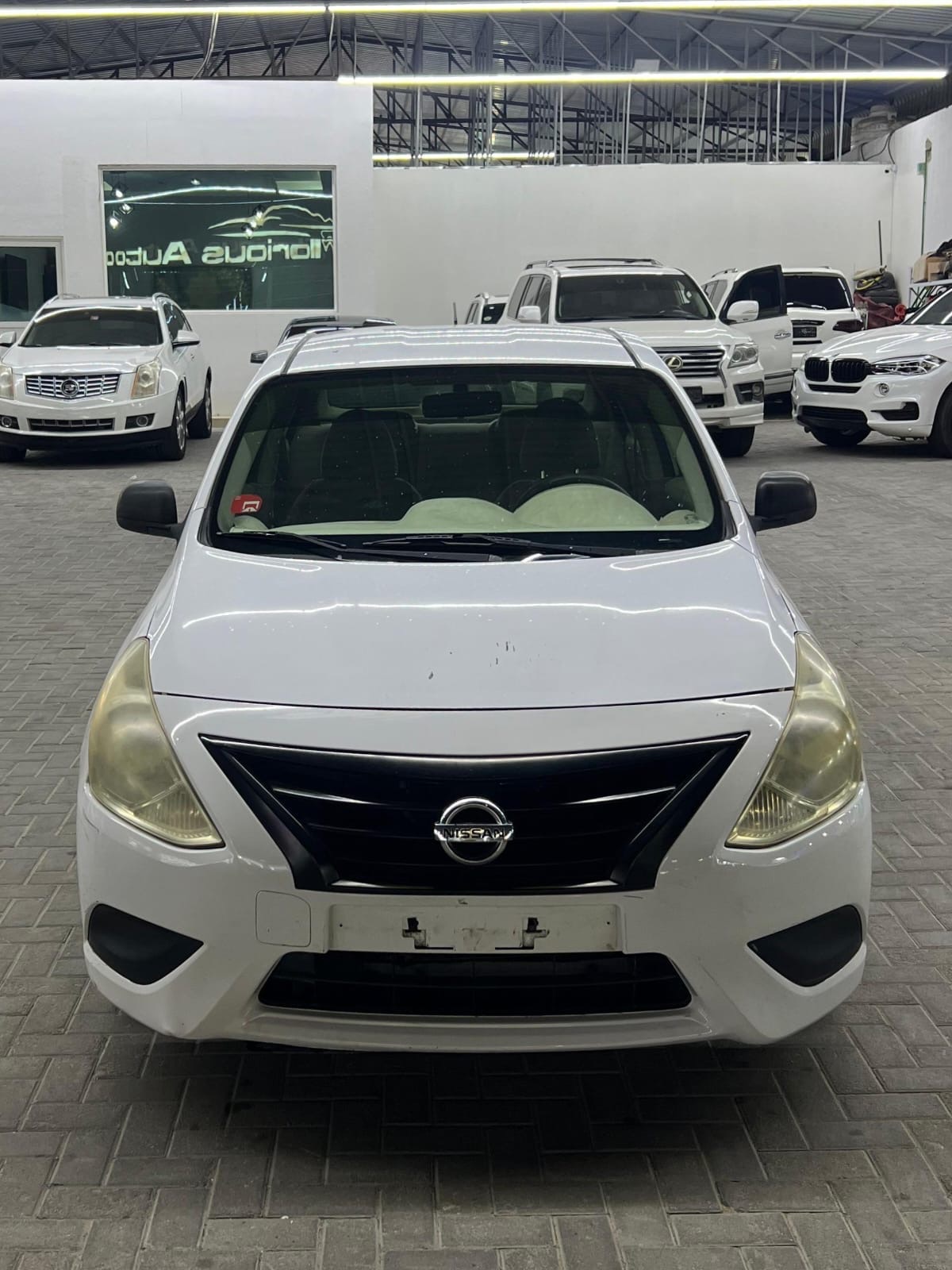 White Nissan Sunny 2016