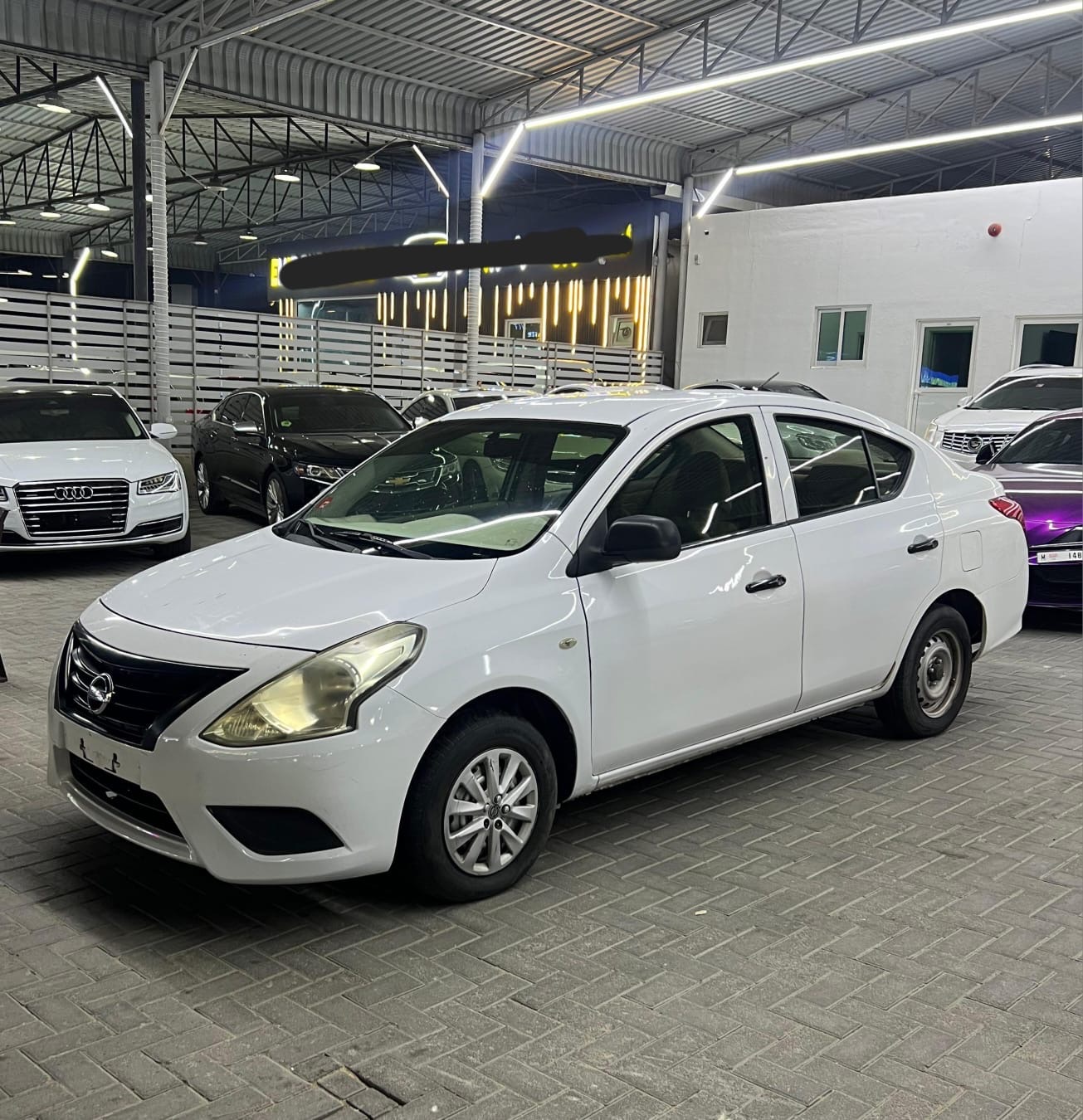 White Nissan Sunny 2016