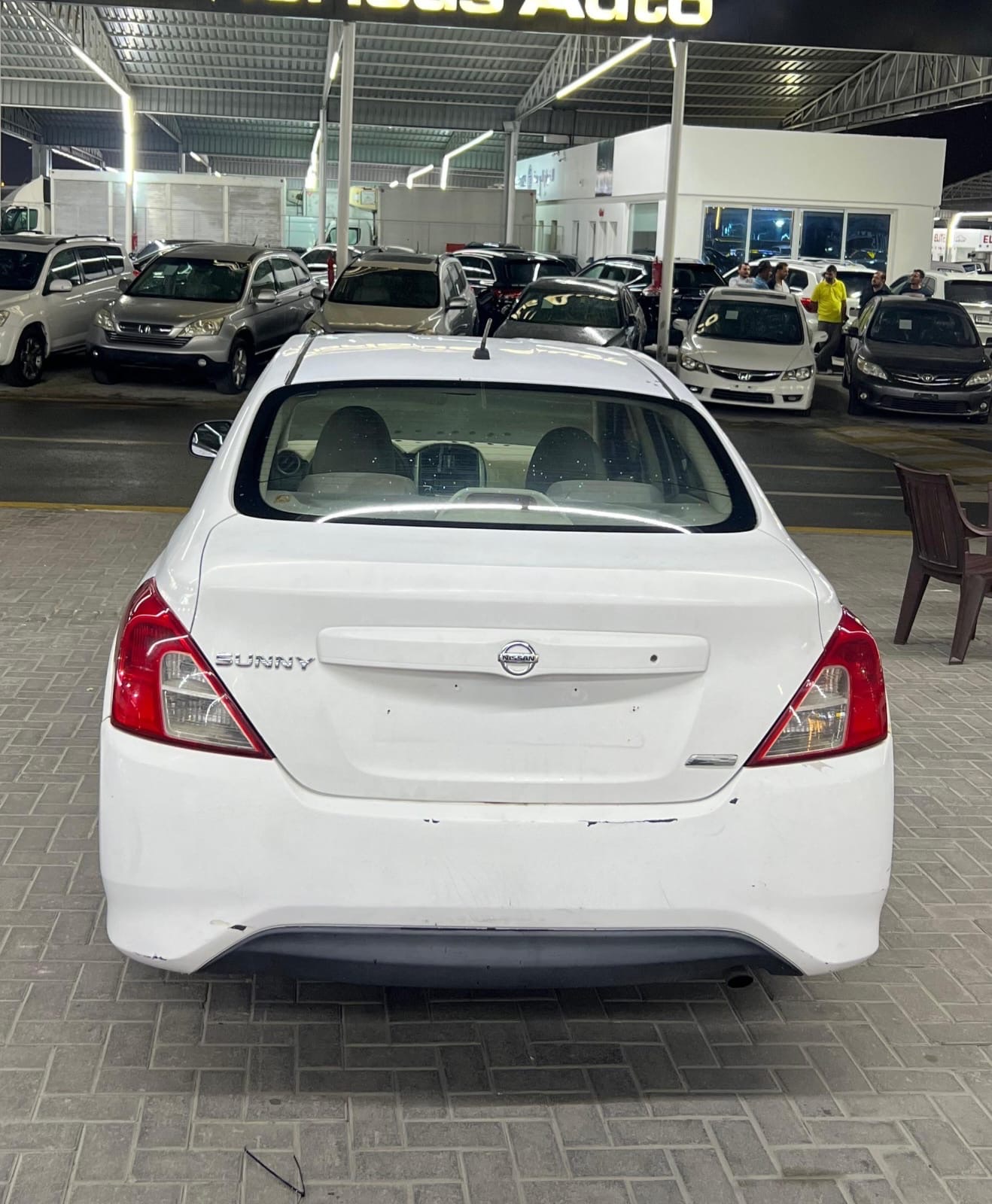 White Nissan Sunny 2016