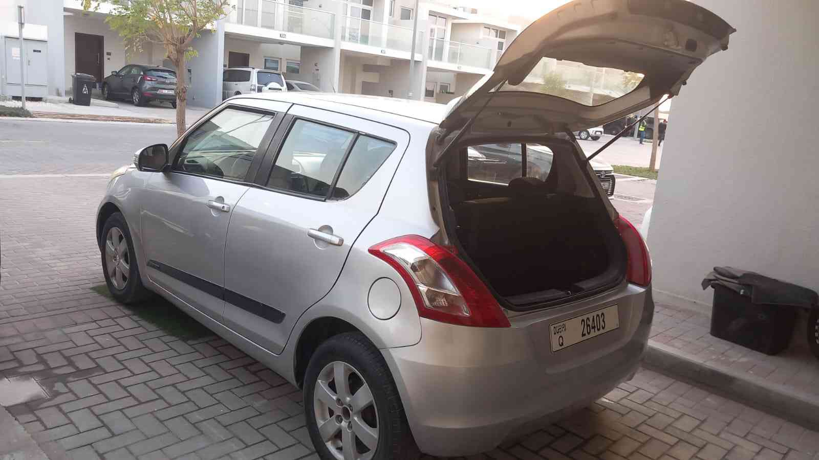 Silver Suzuki Swift GL 2015