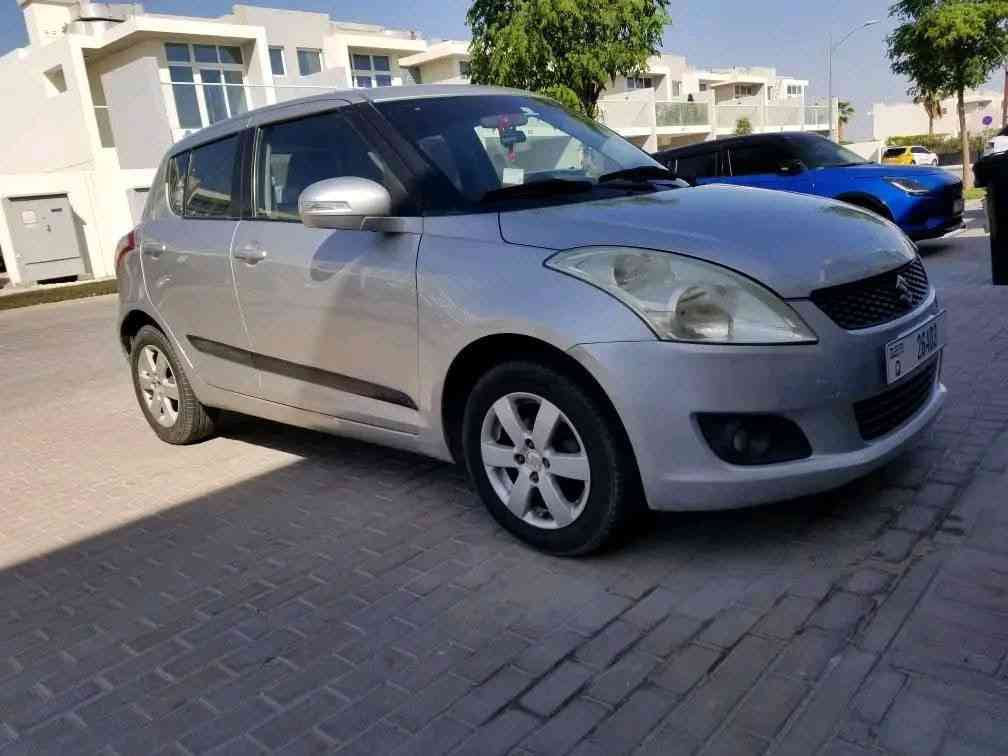 Silver Suzuki Swift GL 2015