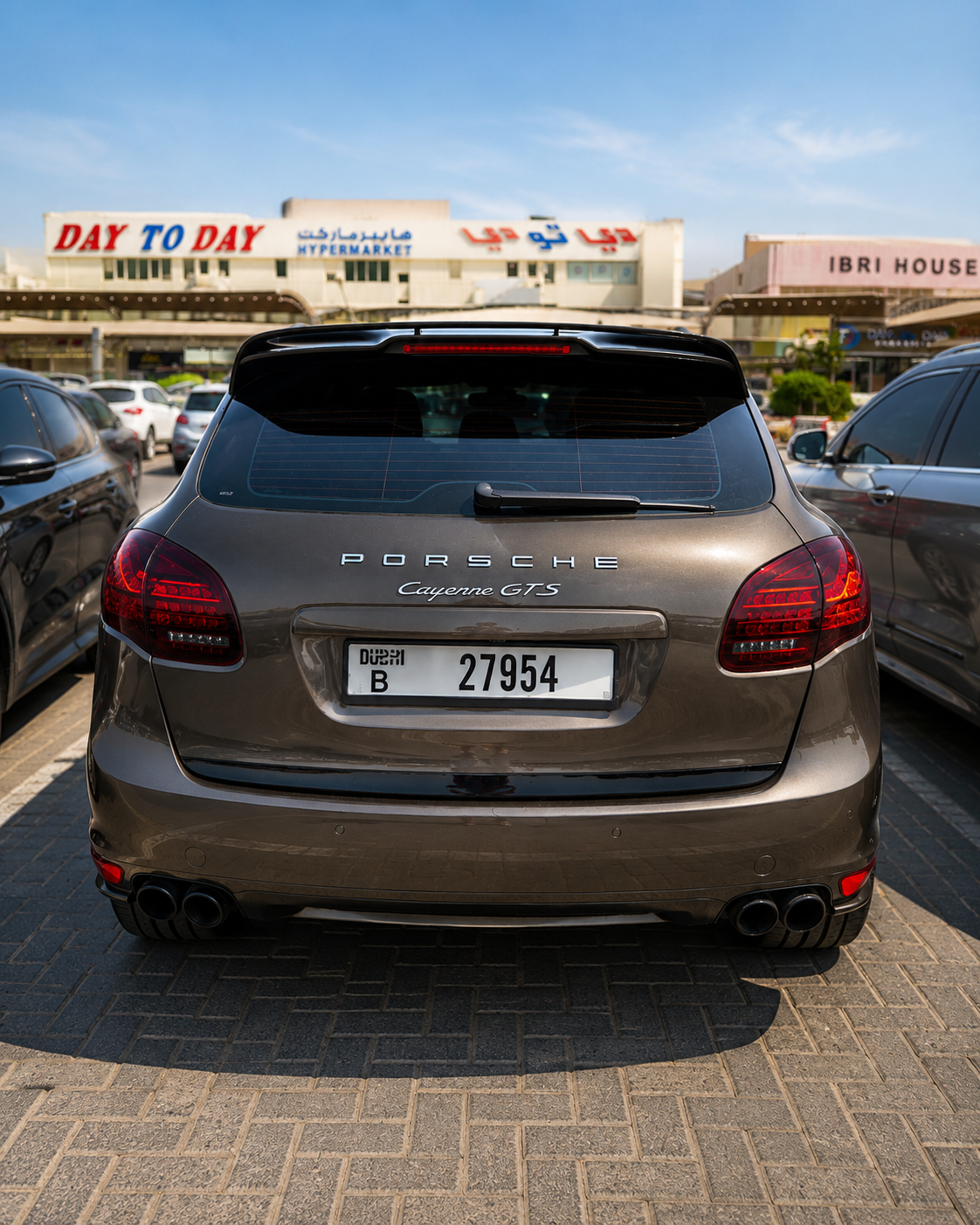 Темно-коричневый Porsche Cayenne GTS 2014 год