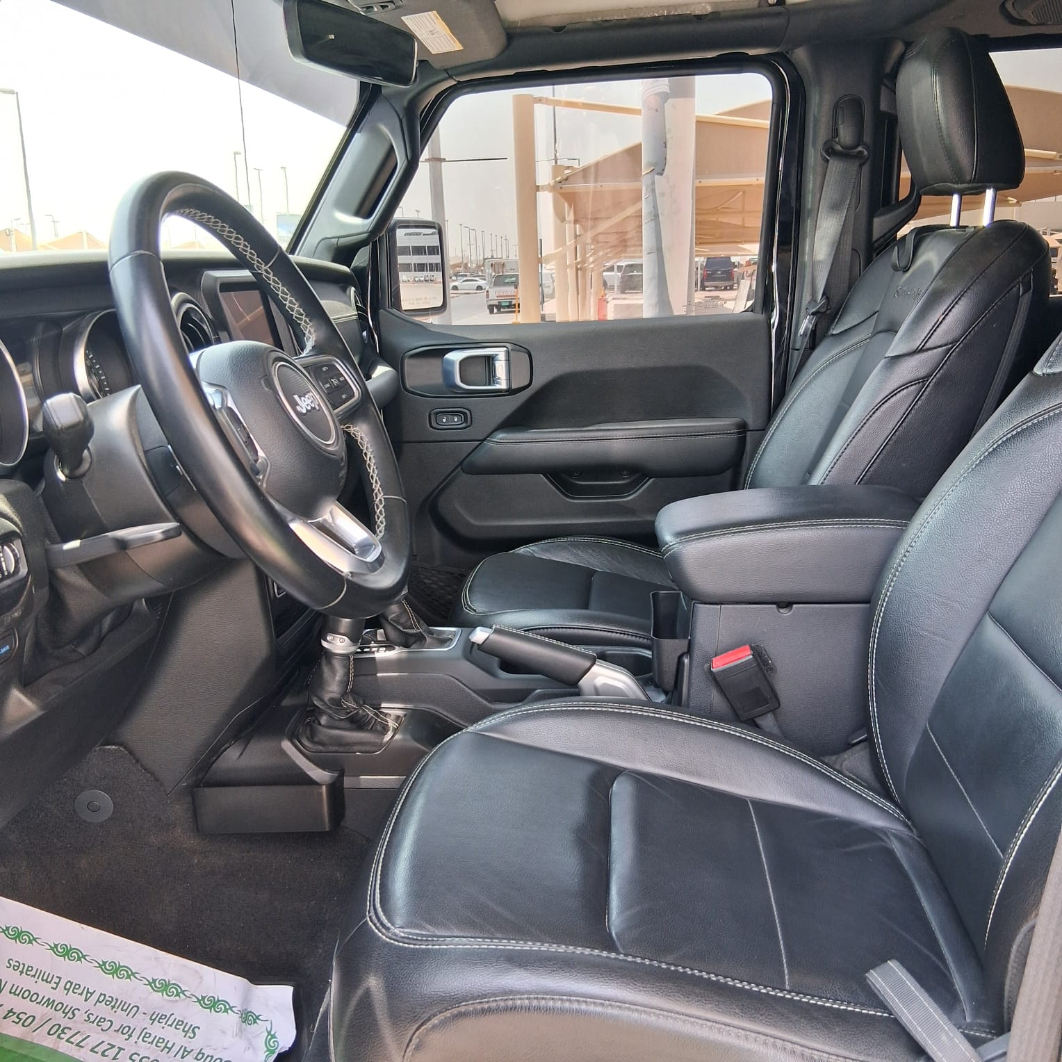 Черный Jeep Wrangler 4xe Unlimited Sahara 2021 год