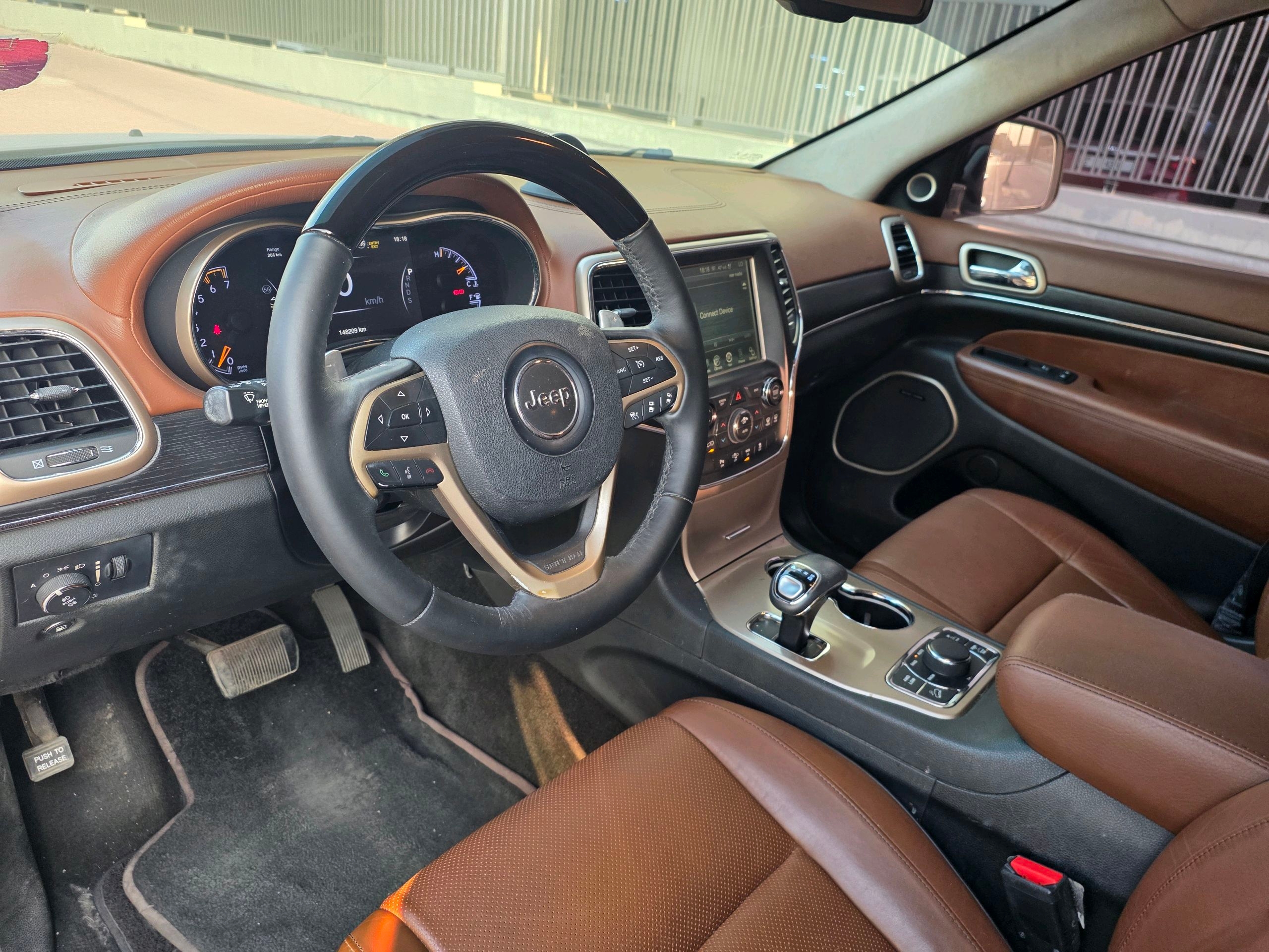 Marrón oscuro Jeep Grand Cherokee Summit 2015