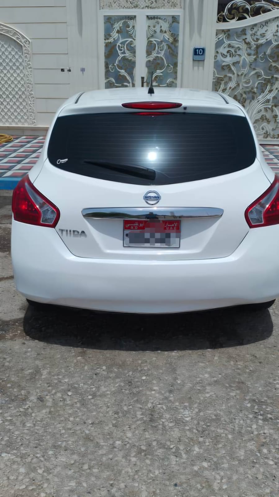 أبيض نيسان Tiida S 2014