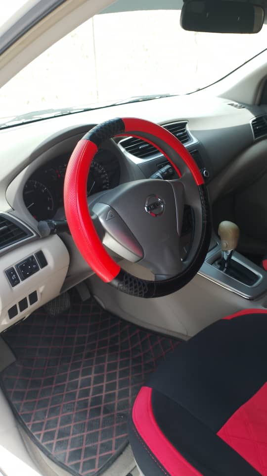 أبيض نيسان Tiida S 2014