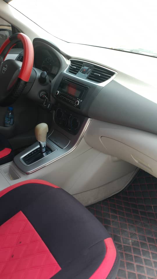 أبيض نيسان Tiida S 2014