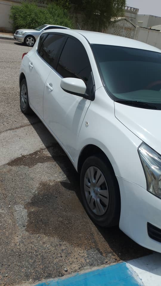 أبيض نيسان Tiida S 2014