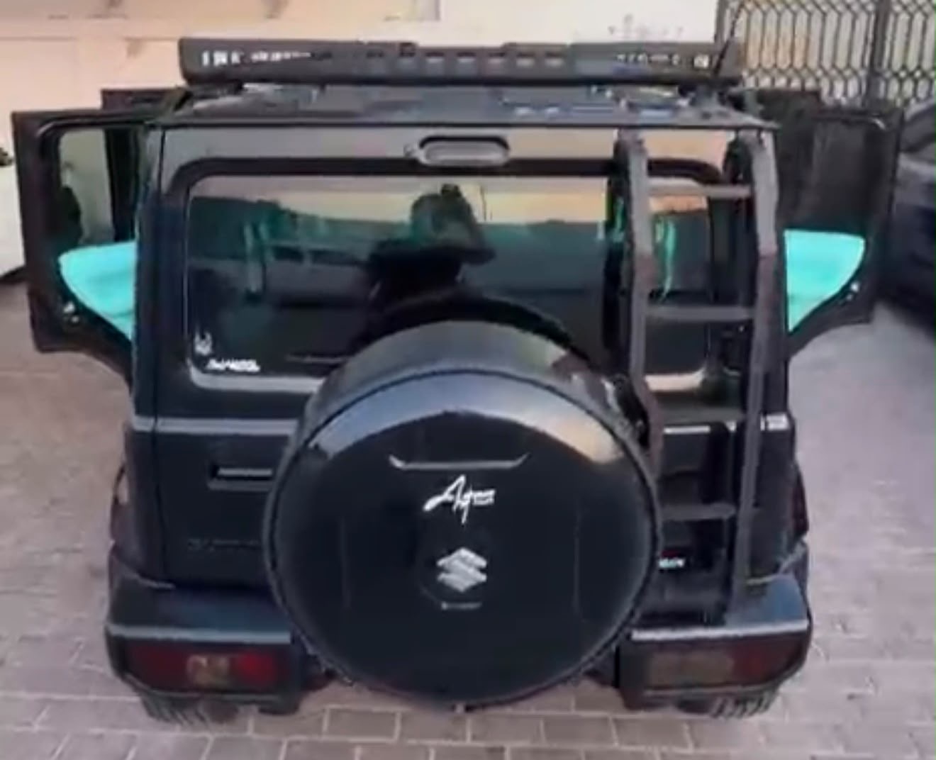 Black Suzuki Jimny with Dronco Body Kit 2026
