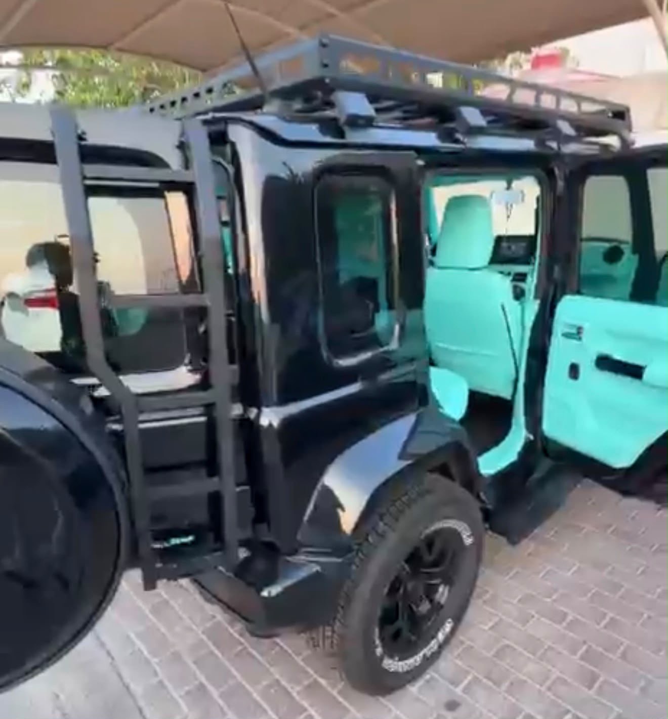 Black Suzuki Jimny with Dronco Body Kit 2026