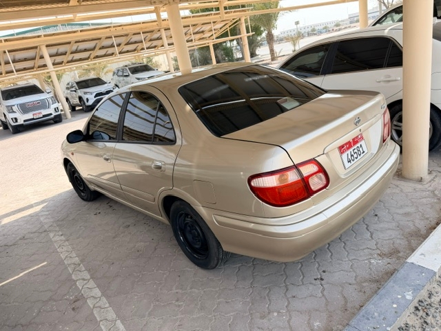 Золото Nissan Sunny EX 2002