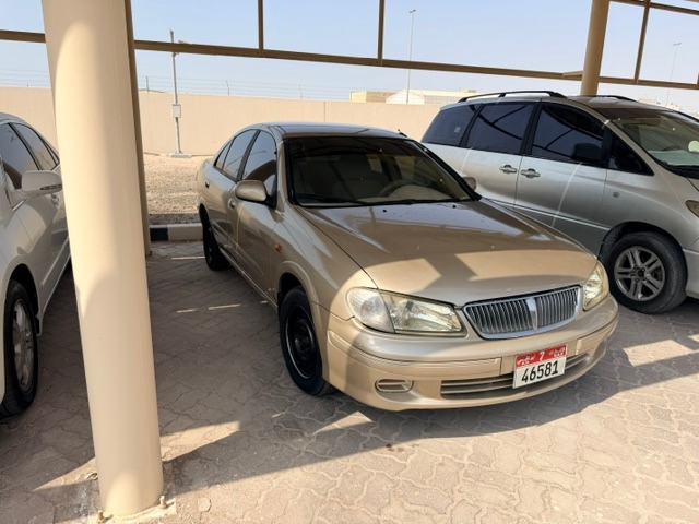 Золото Nissan Sunny EX 2002