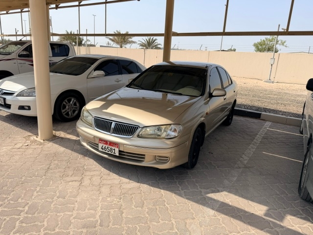 Золото Nissan Sunny EX 2002