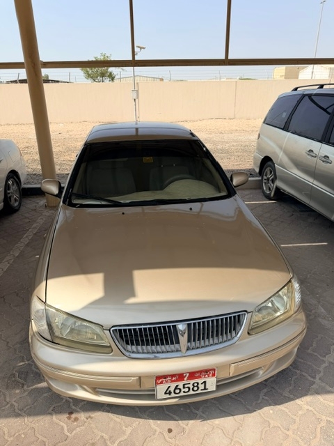 Золото Nissan Sunny EX 2002