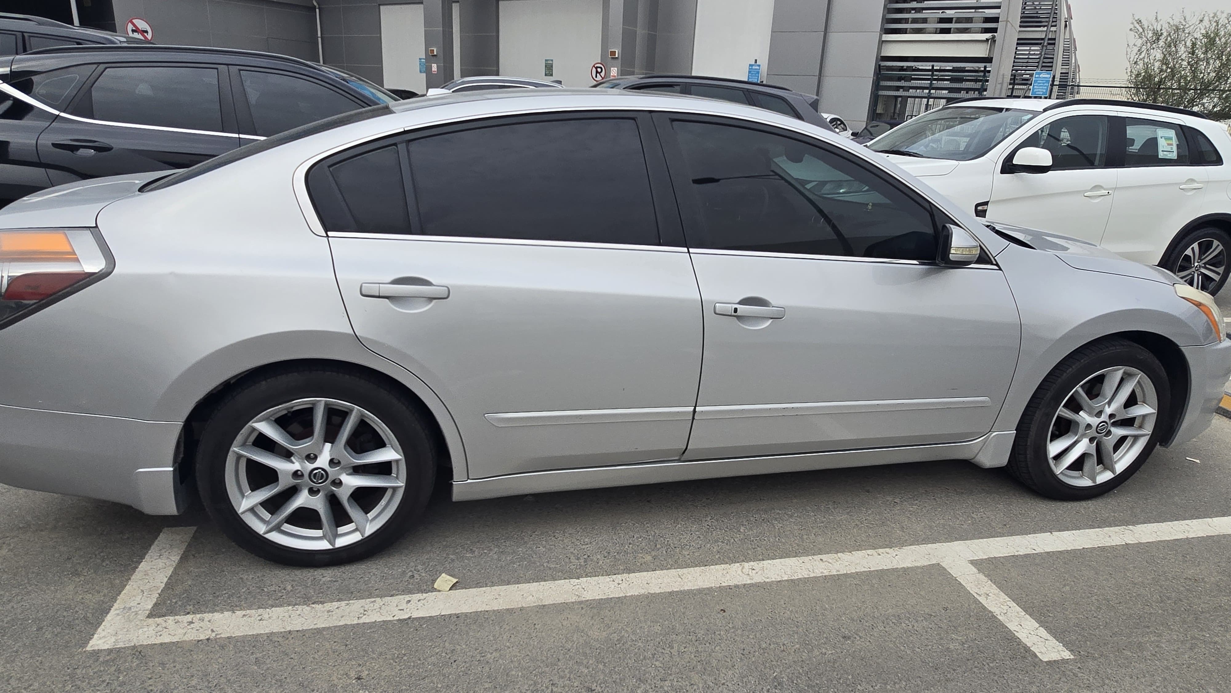 Silver Nissan Altima 2.5 S 2010