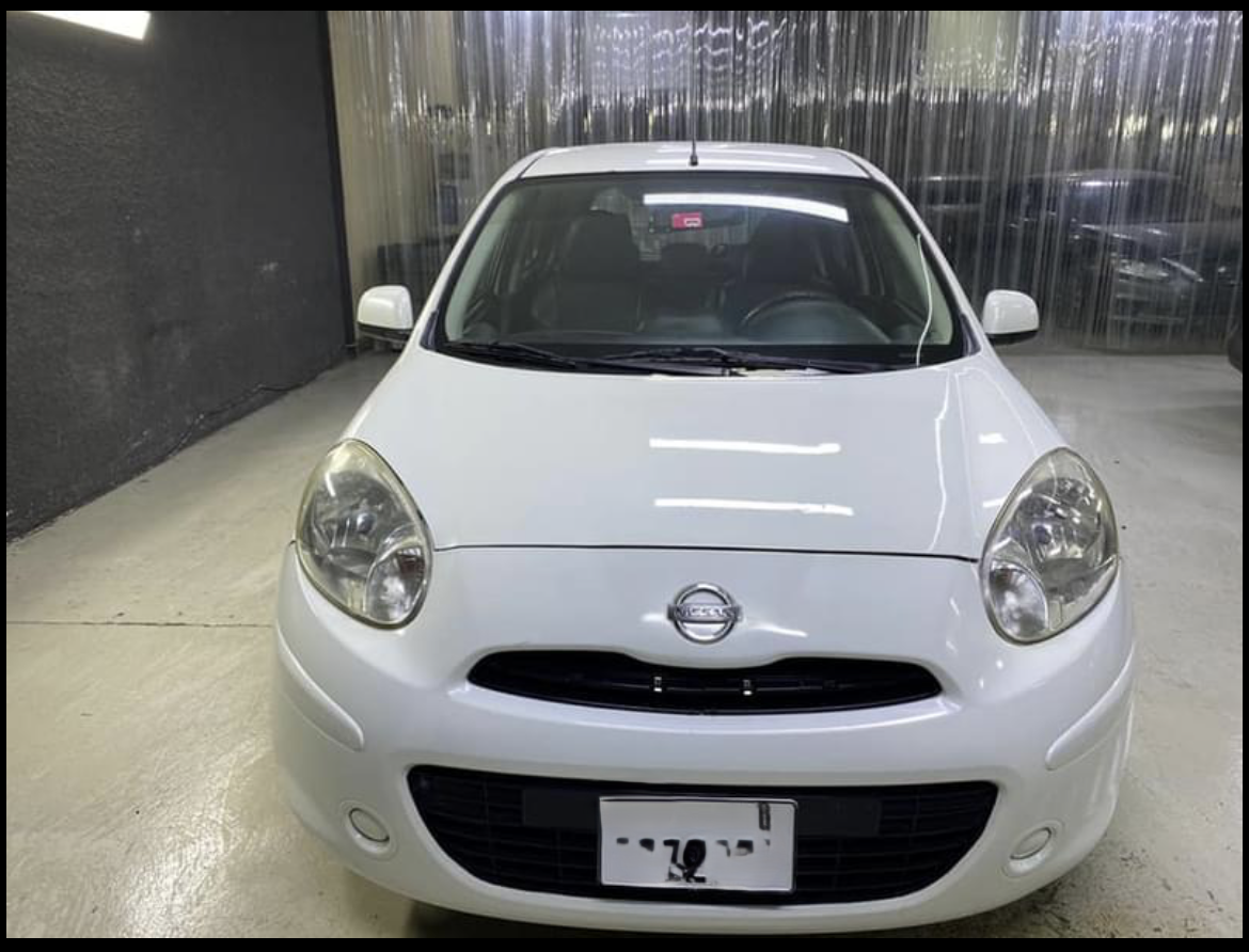 White Nissan Micra 2012