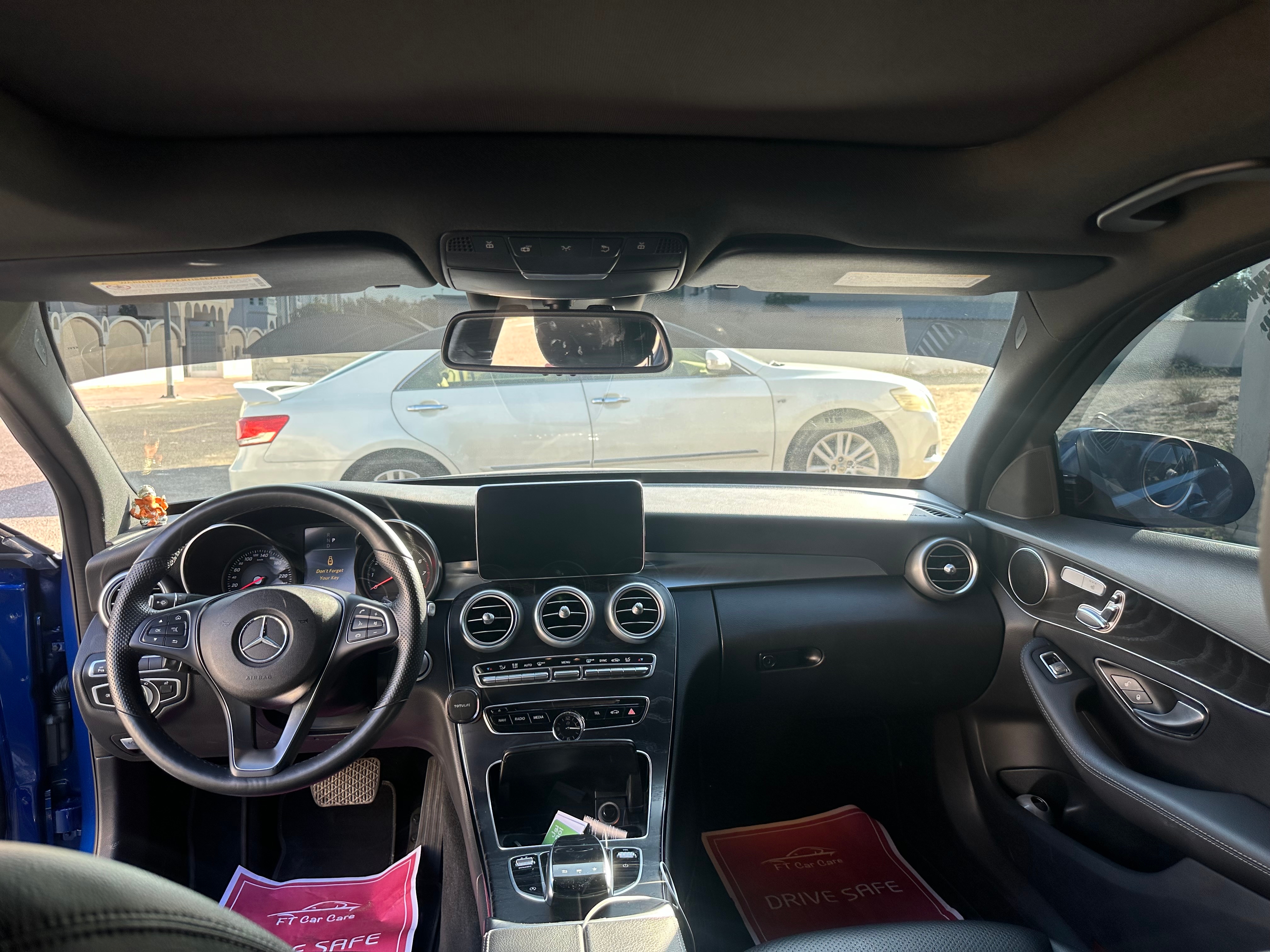 Blue Mercedes Benz C300 AMG 2018