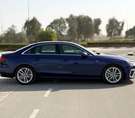 Голубой Audi A4 S Line 2022 год
