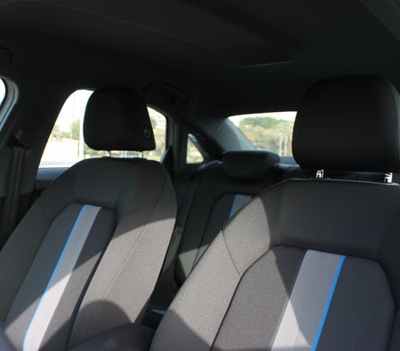 Голубой Audi A3 2023 год