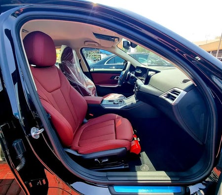 Black BMW 318i 2025