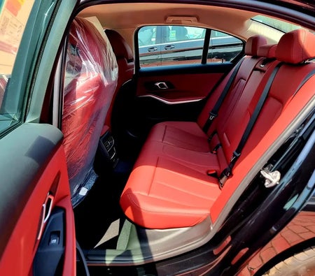 Black BMW 318i 2025