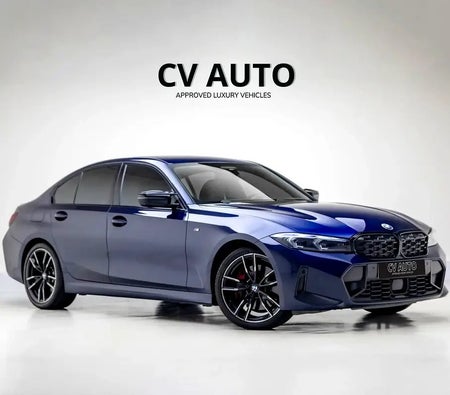 Blue BMW M340i 2023