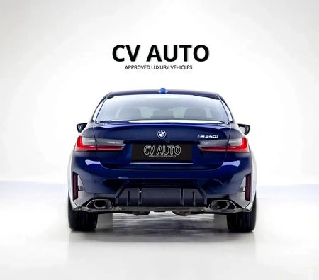 Blue BMW M340i 2023