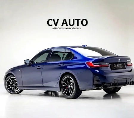 Blue BMW M340i 2023