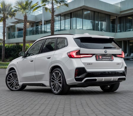 White BMW iX1 eDrive30 M Sport 2024