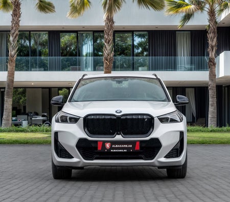 White BMW iX1 eDrive30 M Sport 2024